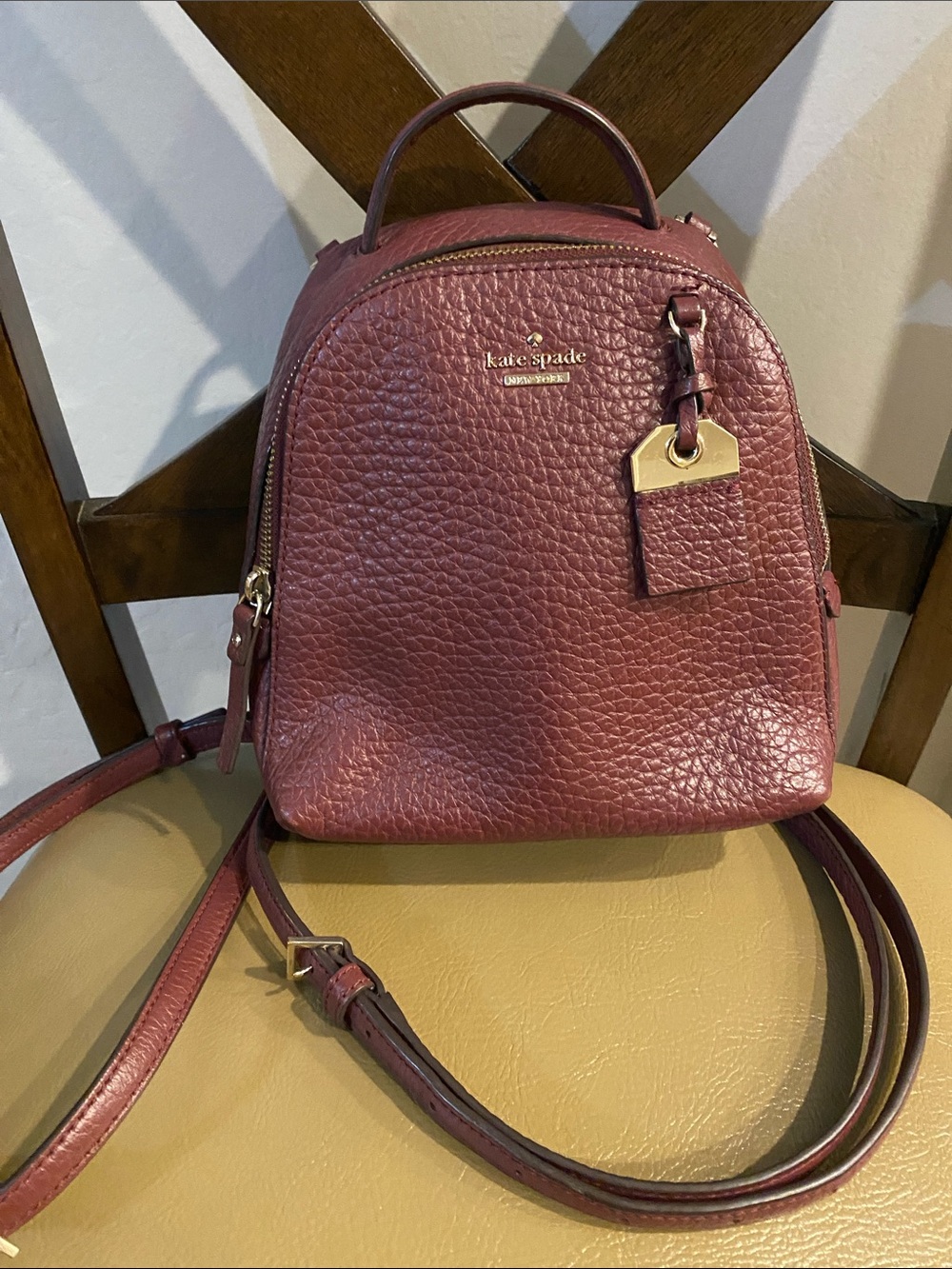 kate spade Pebbled Leather Mini Backpack in Wine